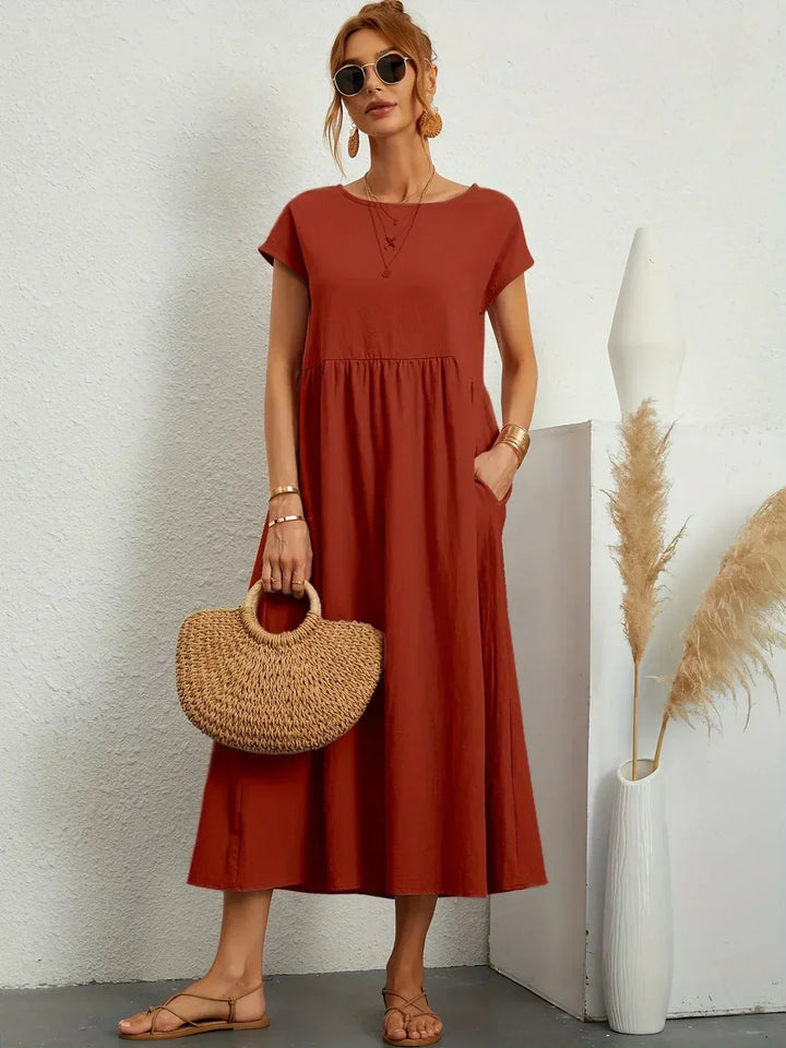Gabrielle™ — Elegancka, midi sukienka o swobodnym kroju