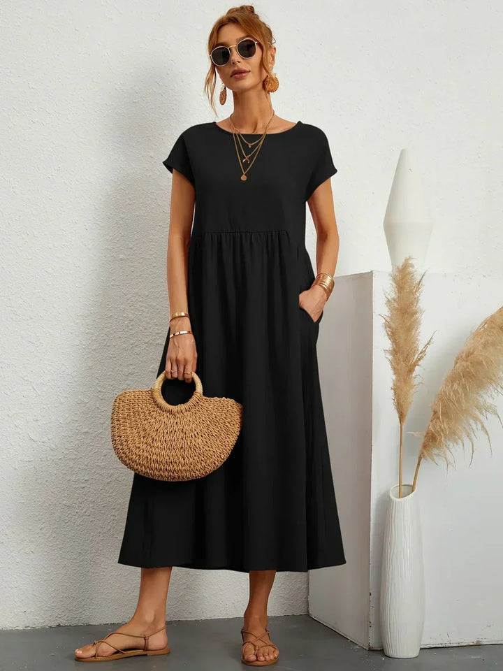 Gabrielle™ — Elegancka, midi sukienka o swobodnym kroju