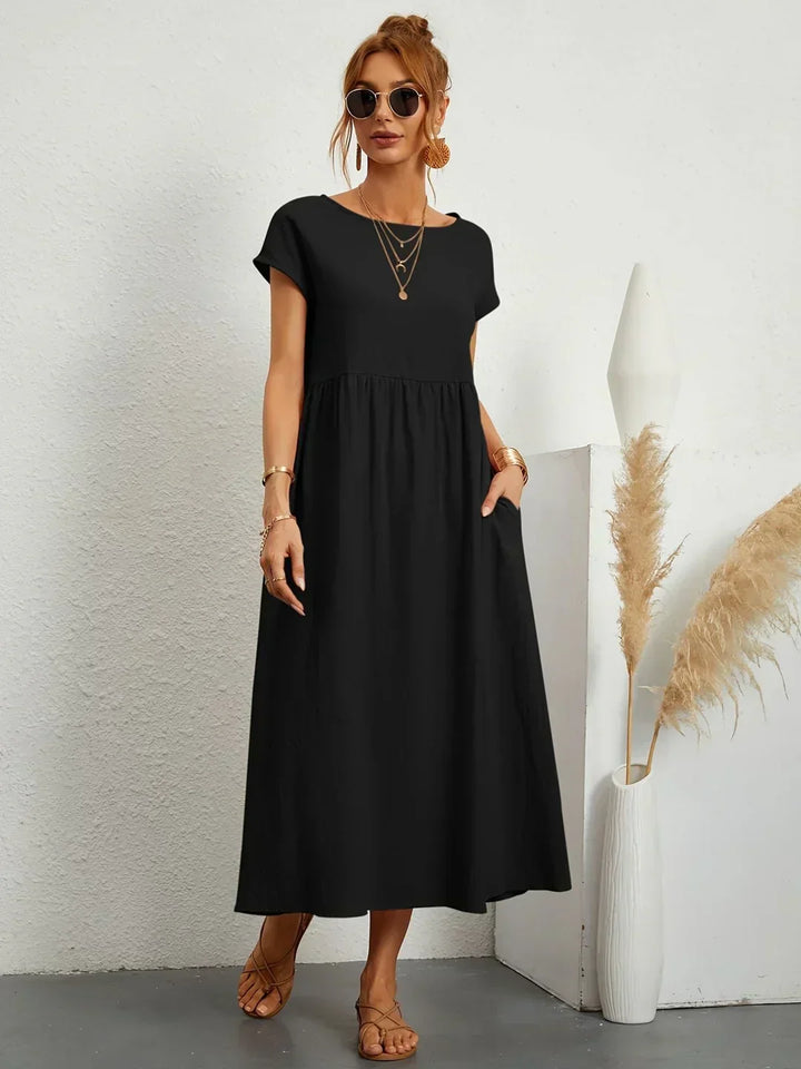 Gabrielle™ — Elegancka, midi sukienka o swobodnym kroju